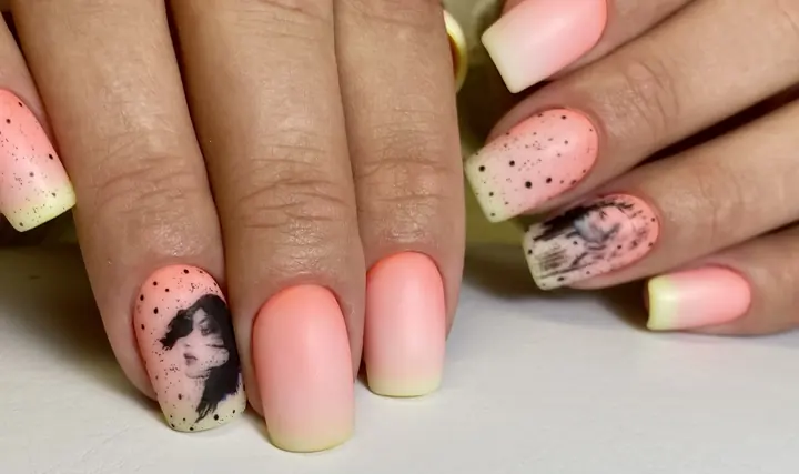 Peach ombre manicure with hand-painted portrait art