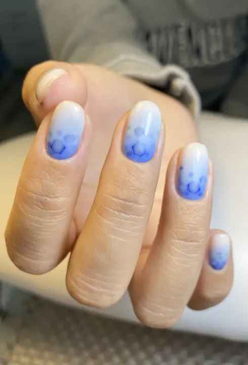 Blue-to-white ombre manicure