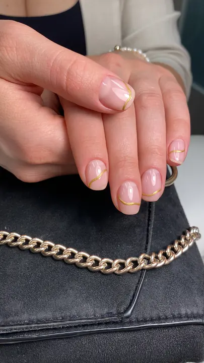 Sheer nude manicure on short natural nails