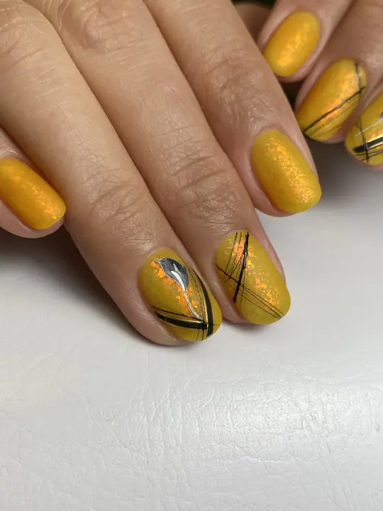Mustard manicure with fine black line art