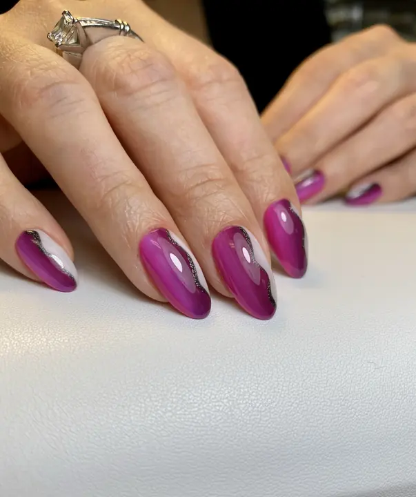 Plum almond hard gel nails with white and silver accents