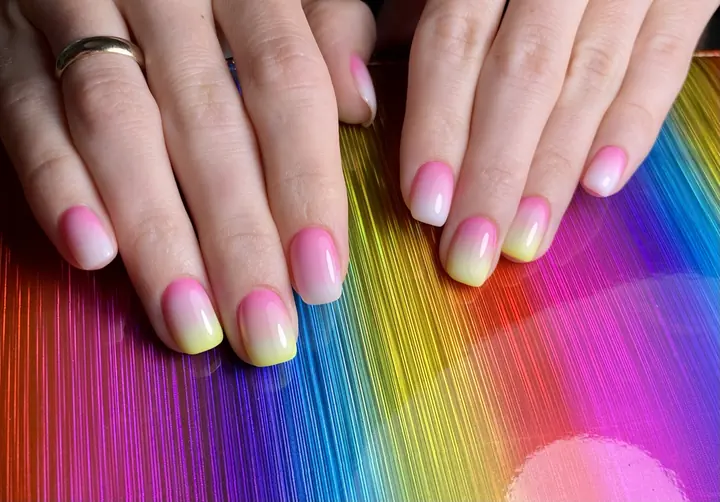 Pink-to-yellow ombre manicure