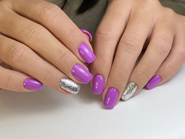 Violet gel manicure with silver glitter accent
