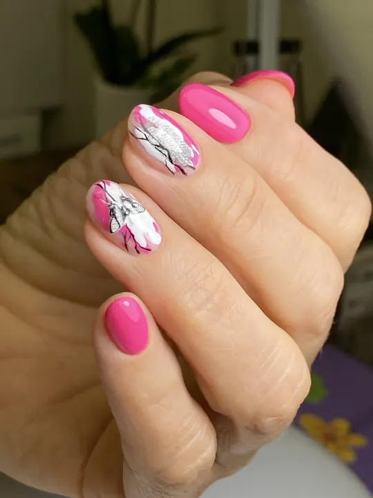 Pink manicure with marble flower art
