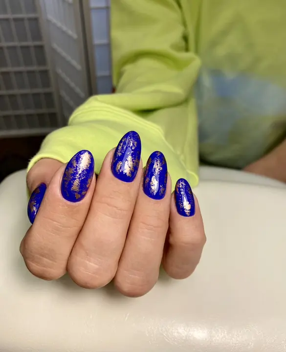 Cobalt blue manicure with gold foil