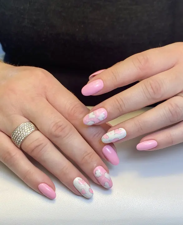 Pastel pink manicure with marble accents