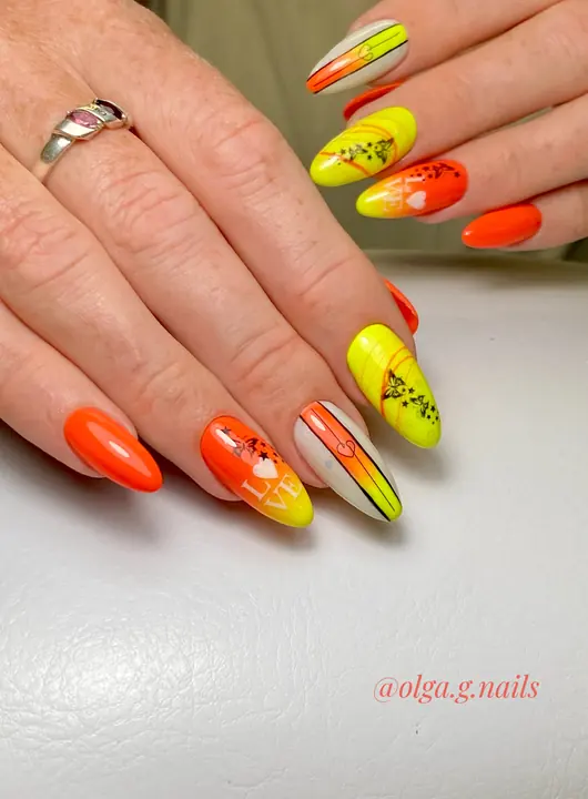 Neon yellow and orange gradient almond nails