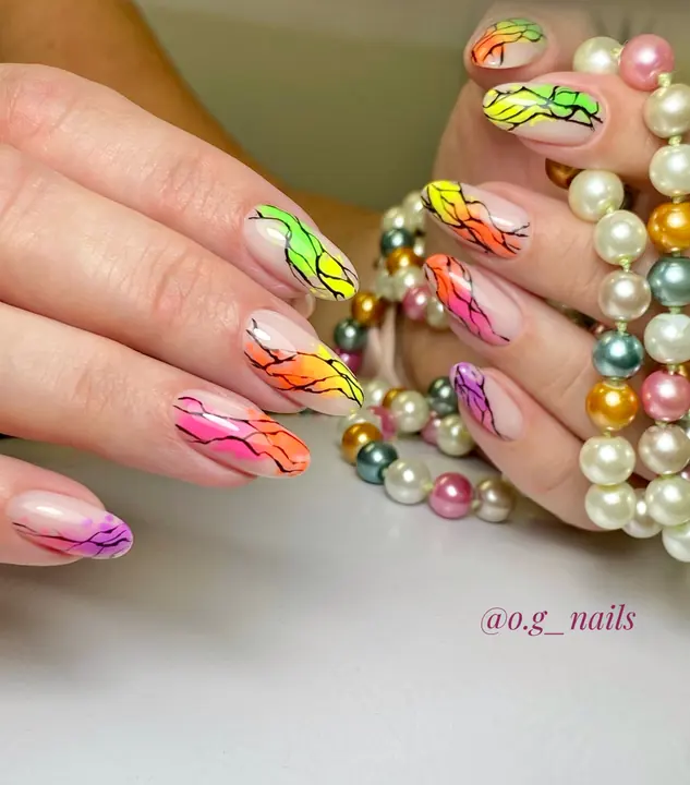 Neon flame design on nude almond nails